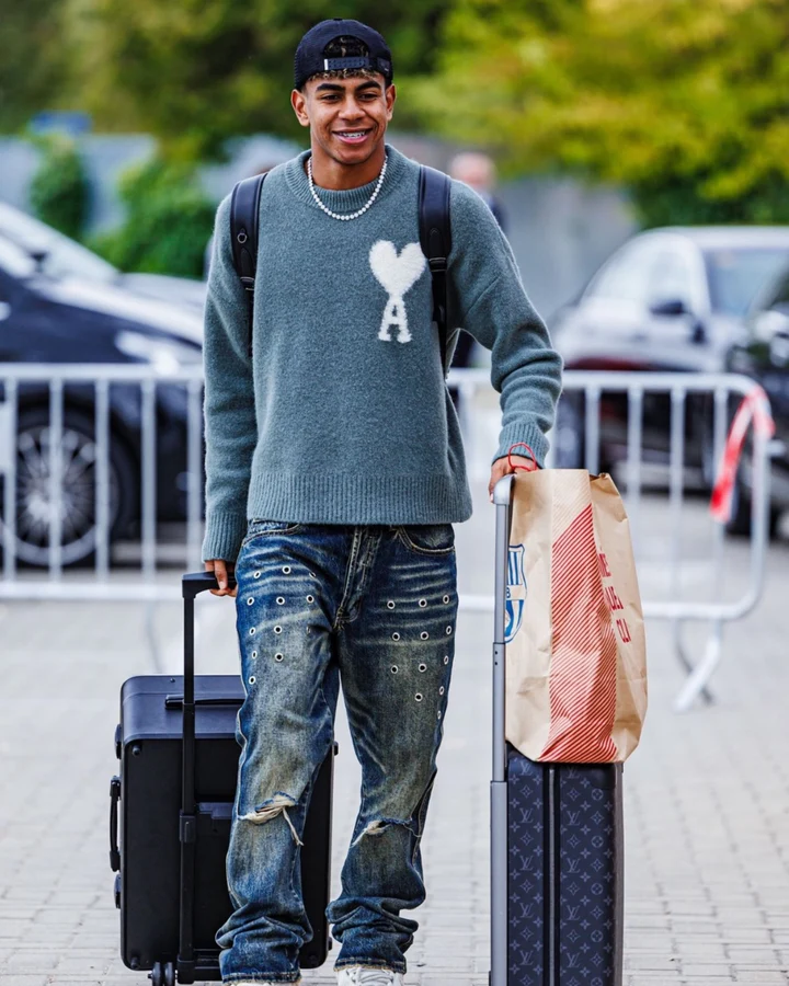 Person with POGA gaming station and luggage